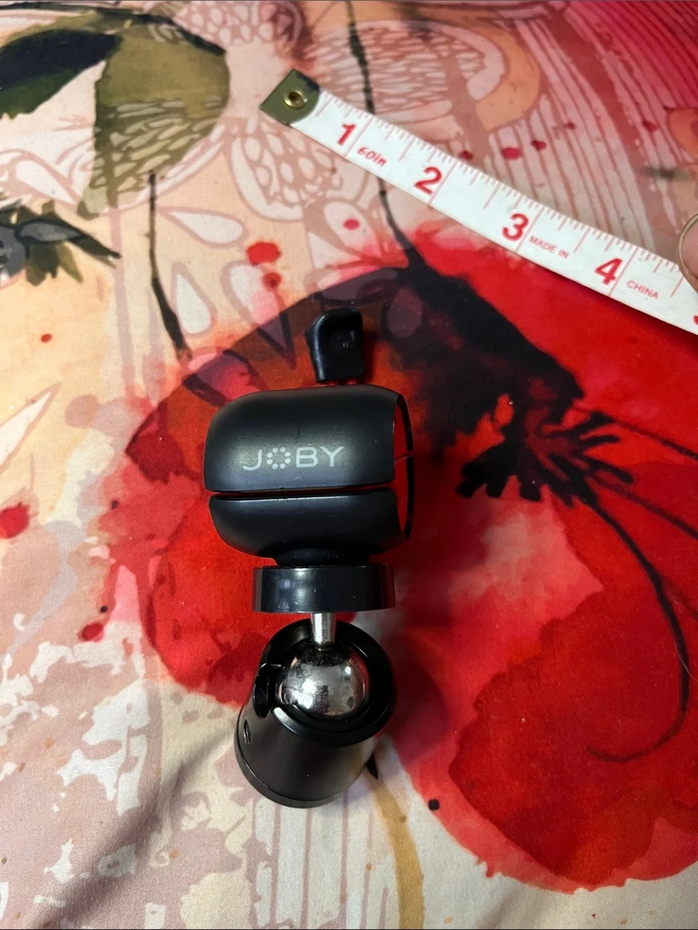 Black & Red Camera Tripod/Monopod Head Accessory